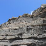 rock face, blue sky