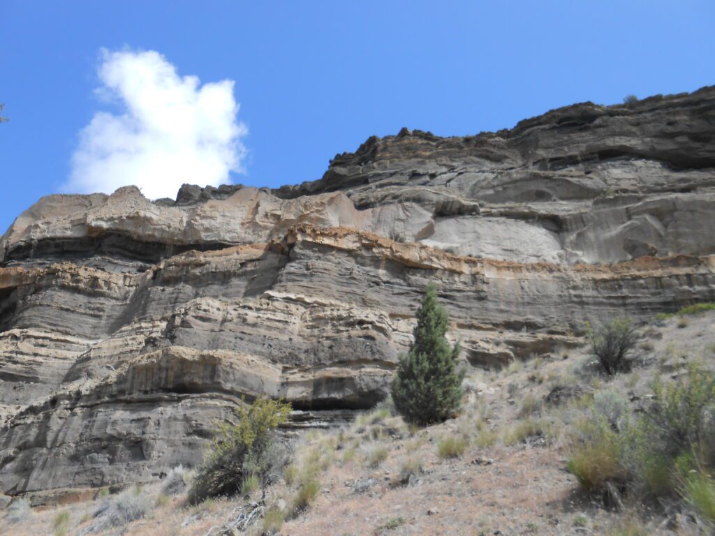 Working on Different Ego Levels Class multi levels of rock and earth, cliff, blue sky