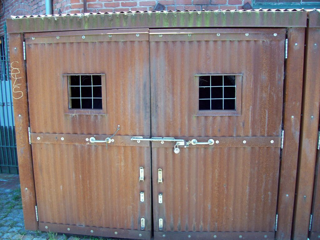 The Cage metal doors