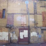 paint patches, facade, doorway, building