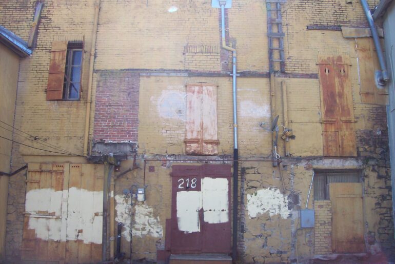 paint patches, facade, doorway, building